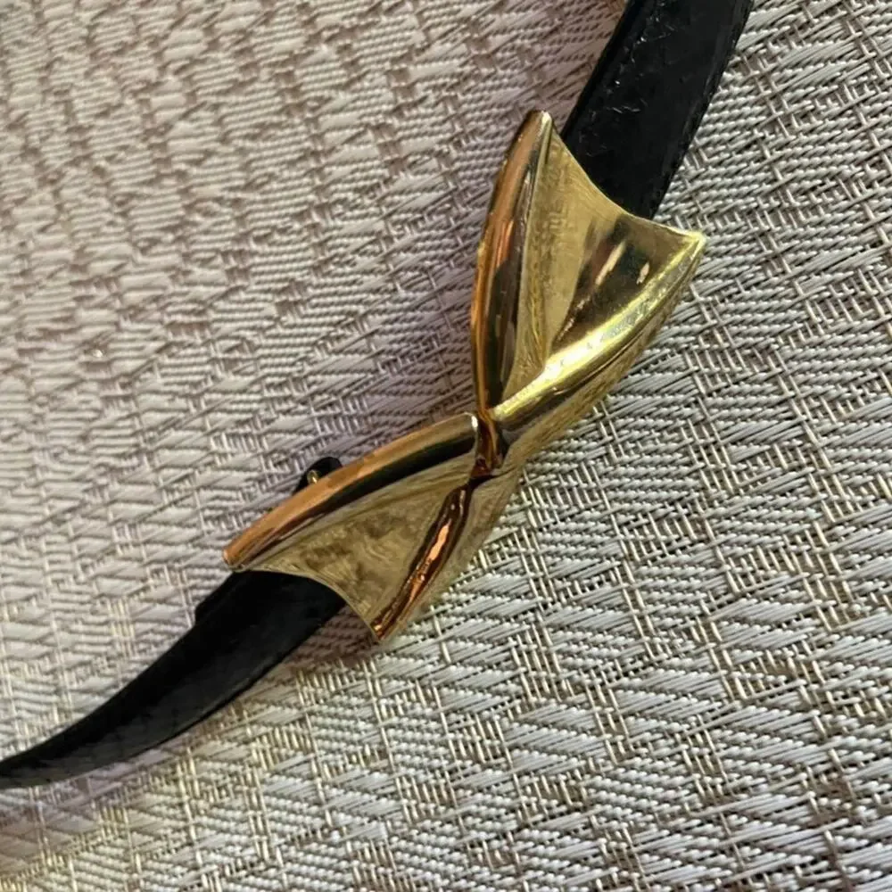 Vintage Dame black eelskin belt gold clip sz S